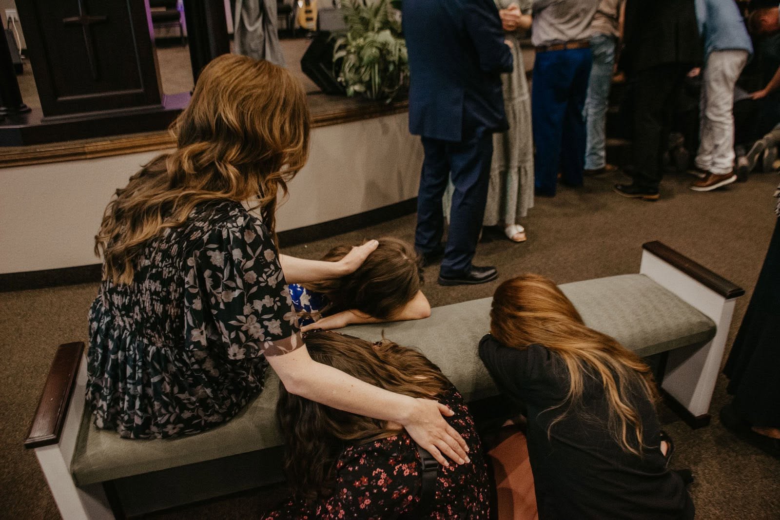 Praying together at Trinity Tabernacle
